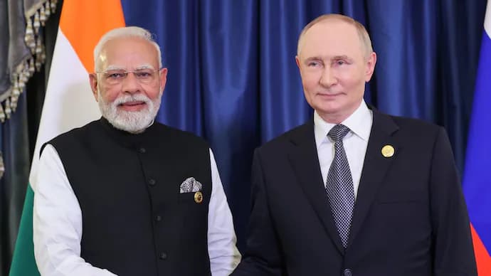 Indian Prime Minister and Russian President shake hands, symbolising India–Russia partnership and strategic relations.